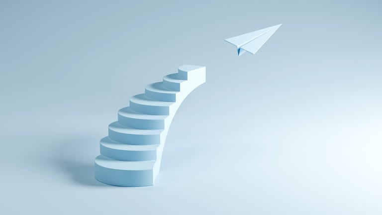 Stairs Leading to Flying Paper Plane - Success, Growth, and Freedom