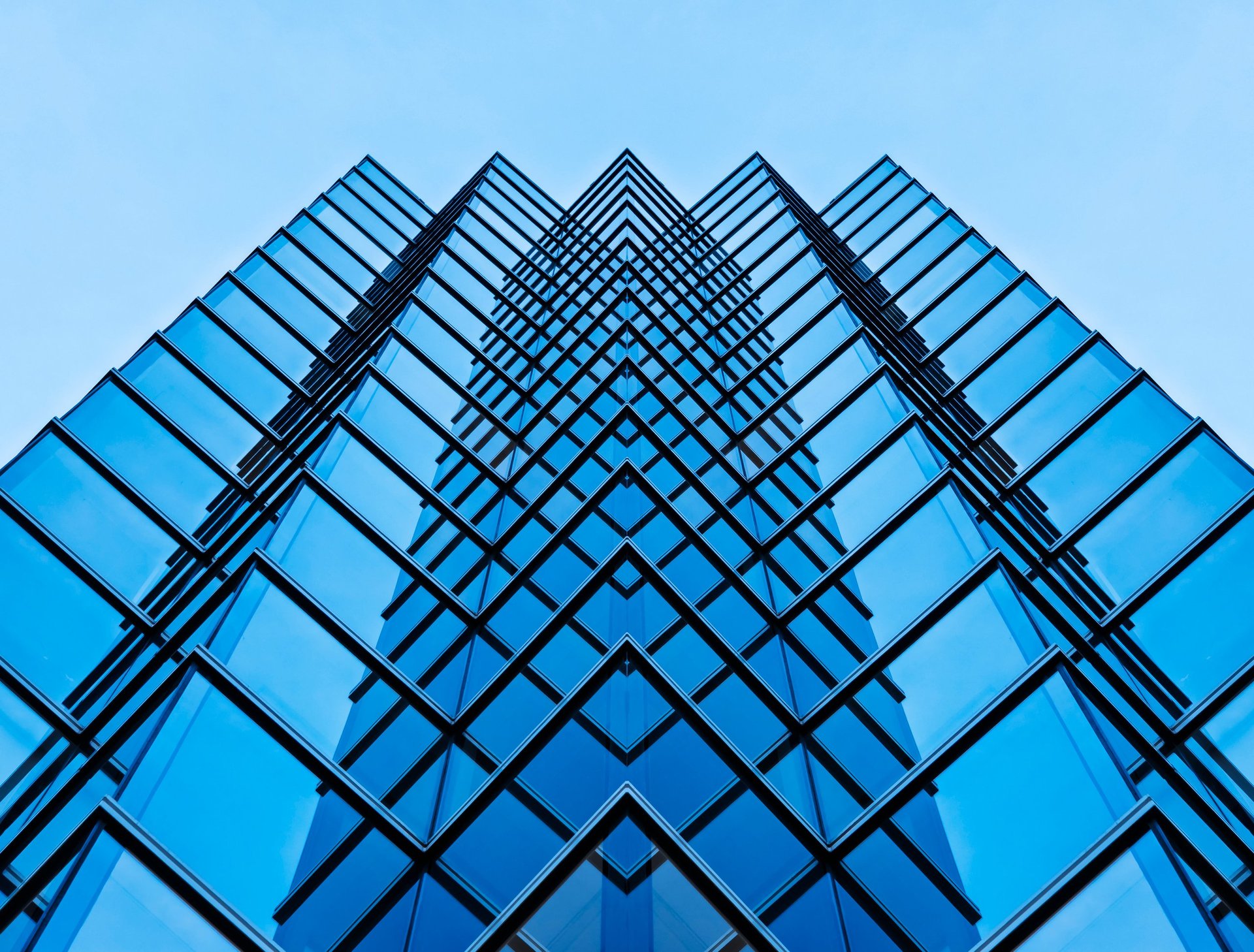 Modern glass building exterior with futuristic architecture