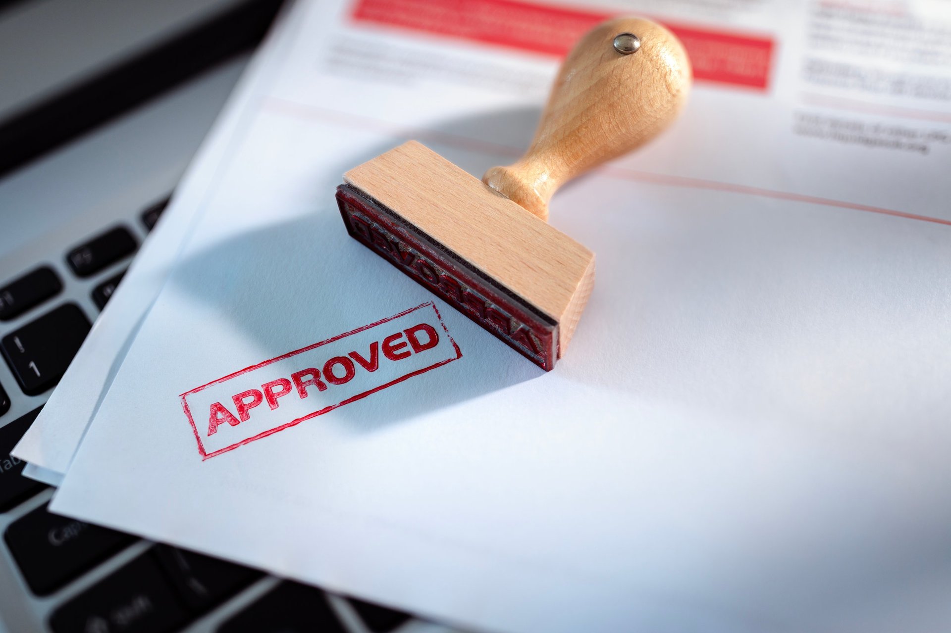 Approved stamp on application form or business agreement document in office
