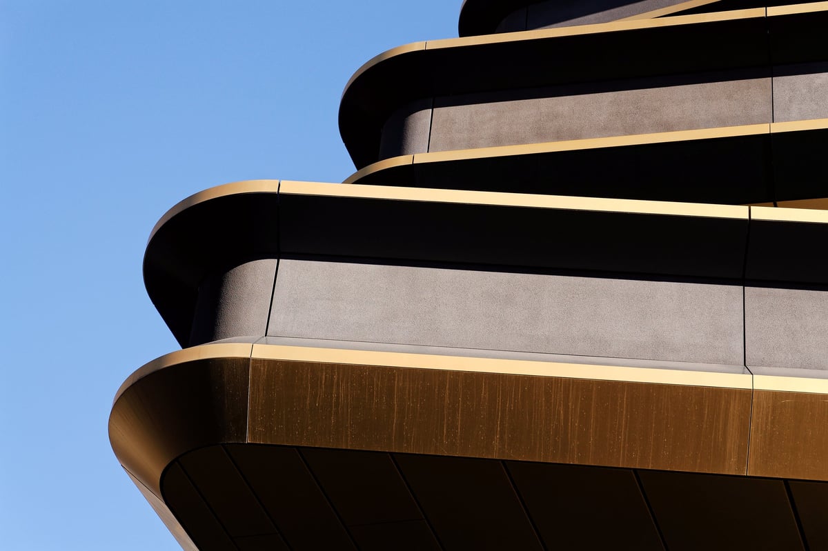 Masarycka MSD Masaryk Station Development office and retail building by Zaha Hadid Architects with golden facade